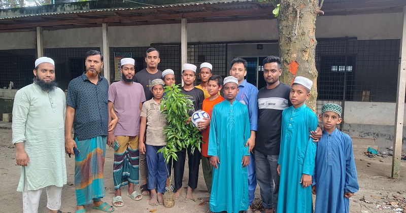 গাছের চারা ও ফুটবল বিতরণ