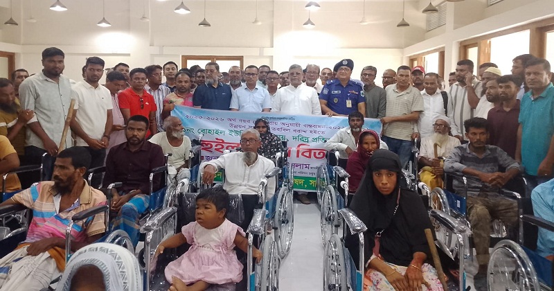 হুইল চেয়ার ও বৃক্ষ বিতরণ কর্মসূচি